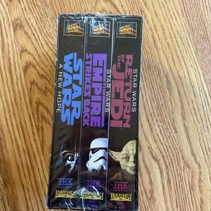 Two VHS Star Wars trilogy, one 1995 unopened new in box 1, 1997 special edition
